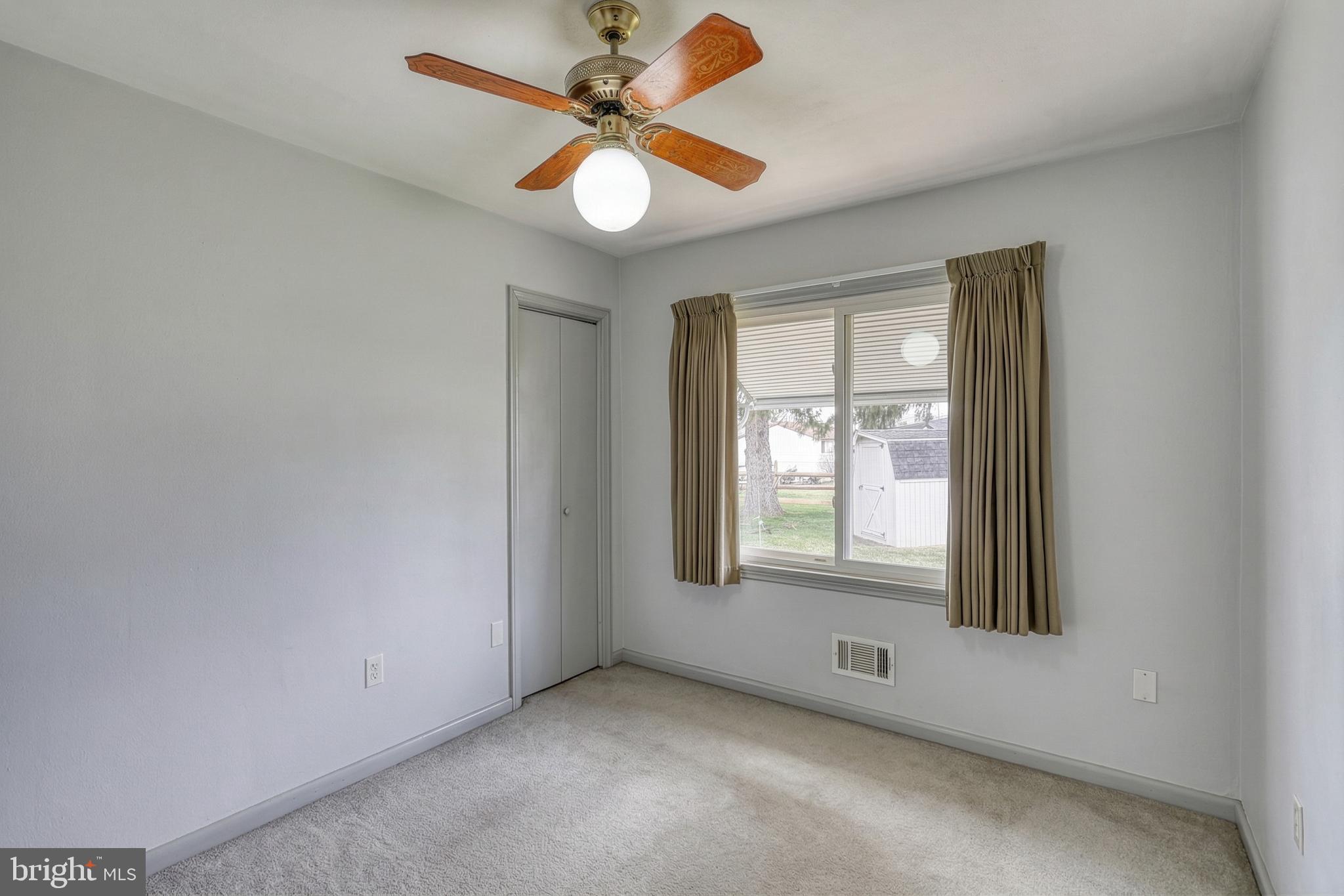 30 Lincoln Drive Hanover, PA 17331 - Photo 39 of 74 an empty room with windows and fan
