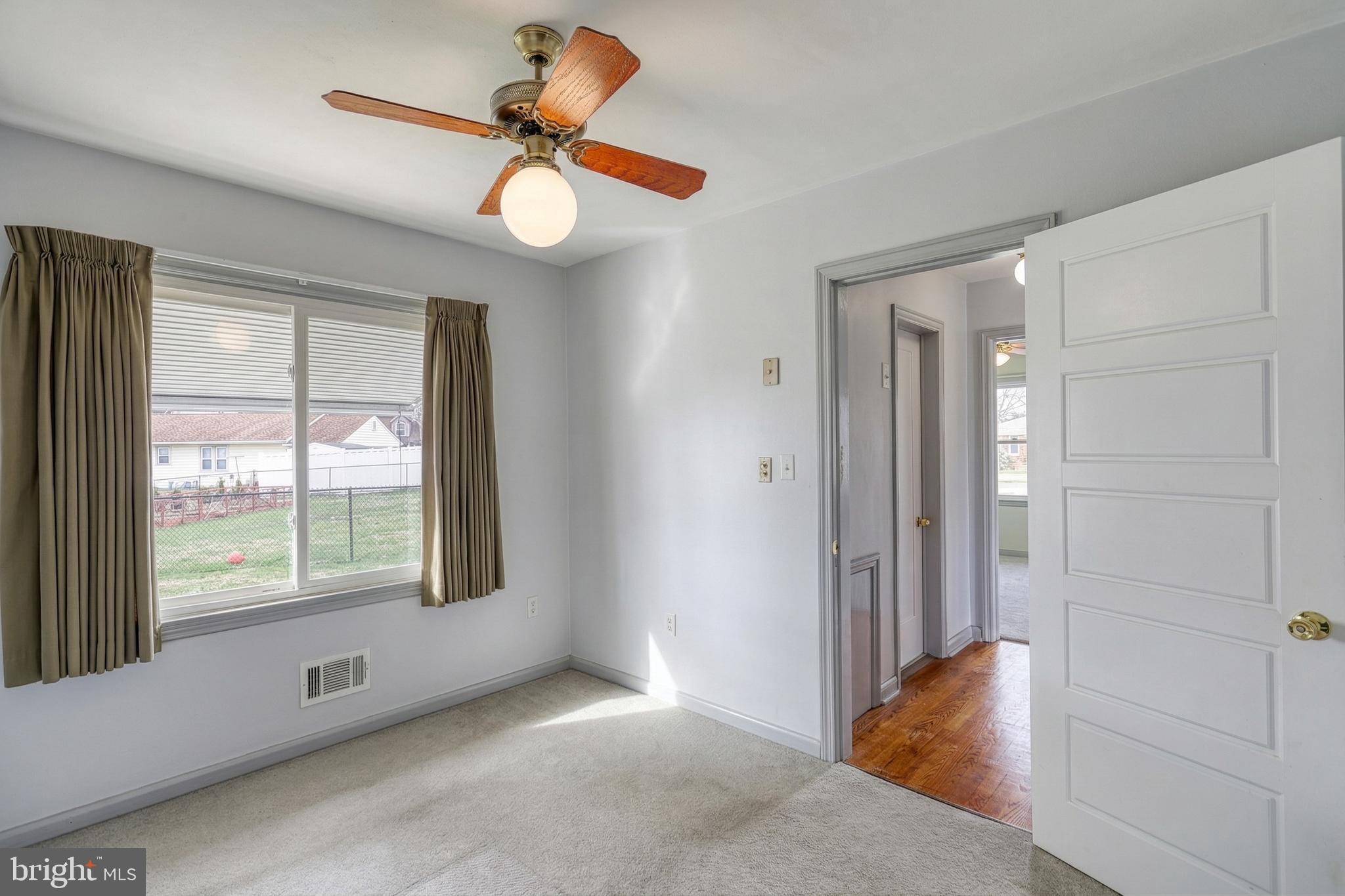 30 Lincoln Drive Hanover, PA 17331 - Photo 41 of 74 wooden floor in an empty room with a window