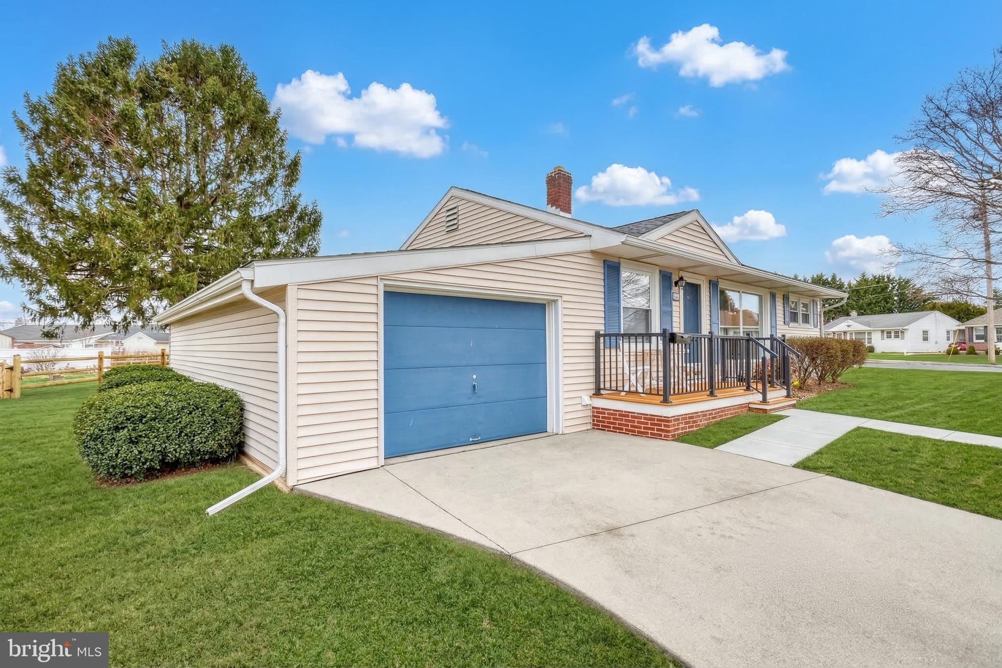 30 Lincoln Drive Hanover, PA 17331 - Photo 5 of 74 a view of a house with a yard and potted plants