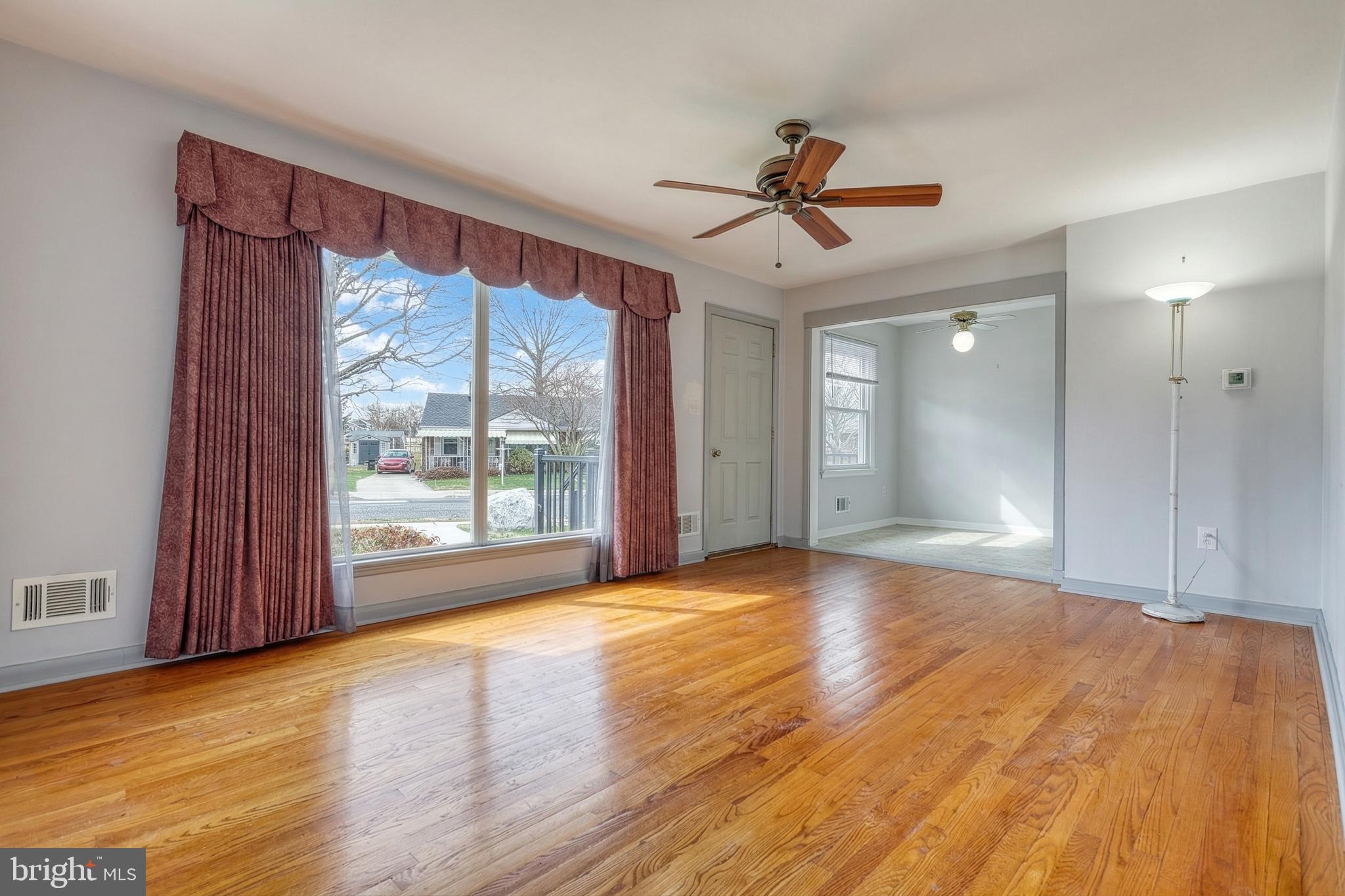 30 Lincoln Drive Hanover, PA 17331 - Photo 10 of 74 a view of an empty room with window and wooden floor