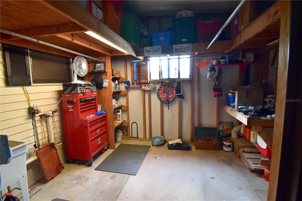 a view of a lake with houses in the back