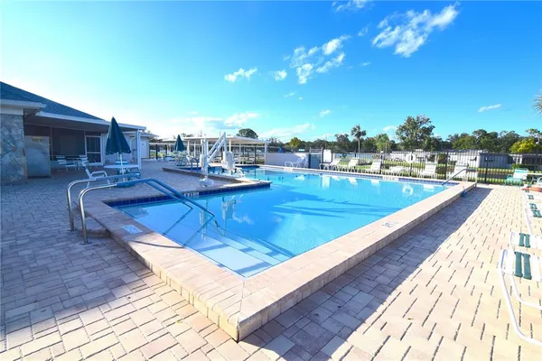 a view of a house with a swimming pool