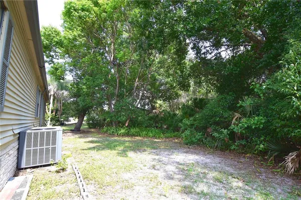 a view of backyard with green space