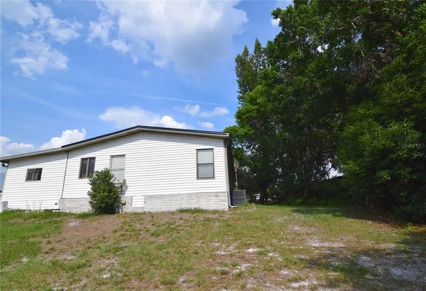a view of backyard of house