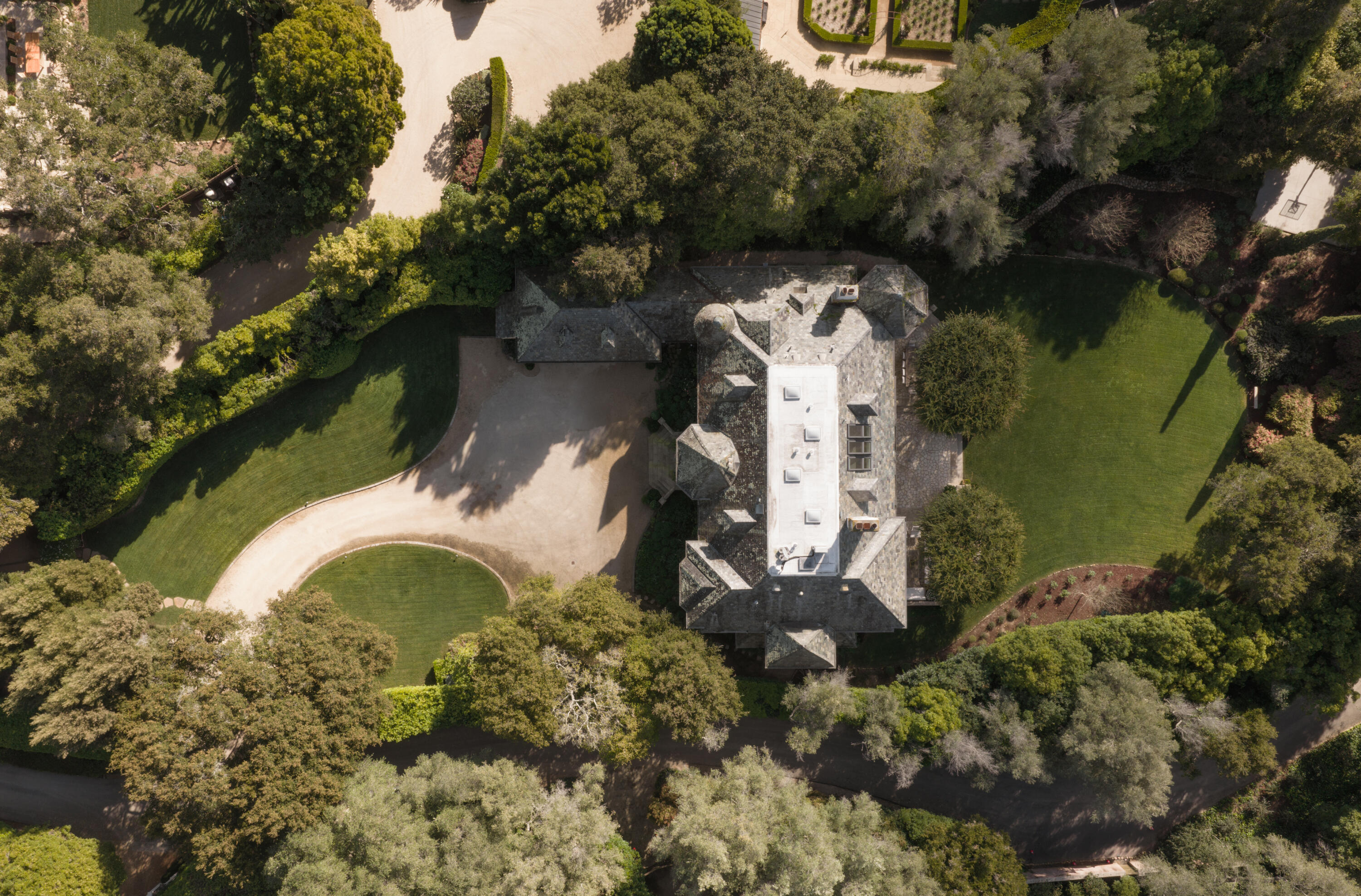 1567 East Valley Road Montecito, CA 93108 - Photo 34 of 34 an aerial view of a house with a yard basket ball court and outdoor seating