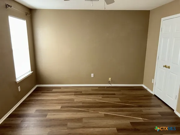 a view of an empty room and window