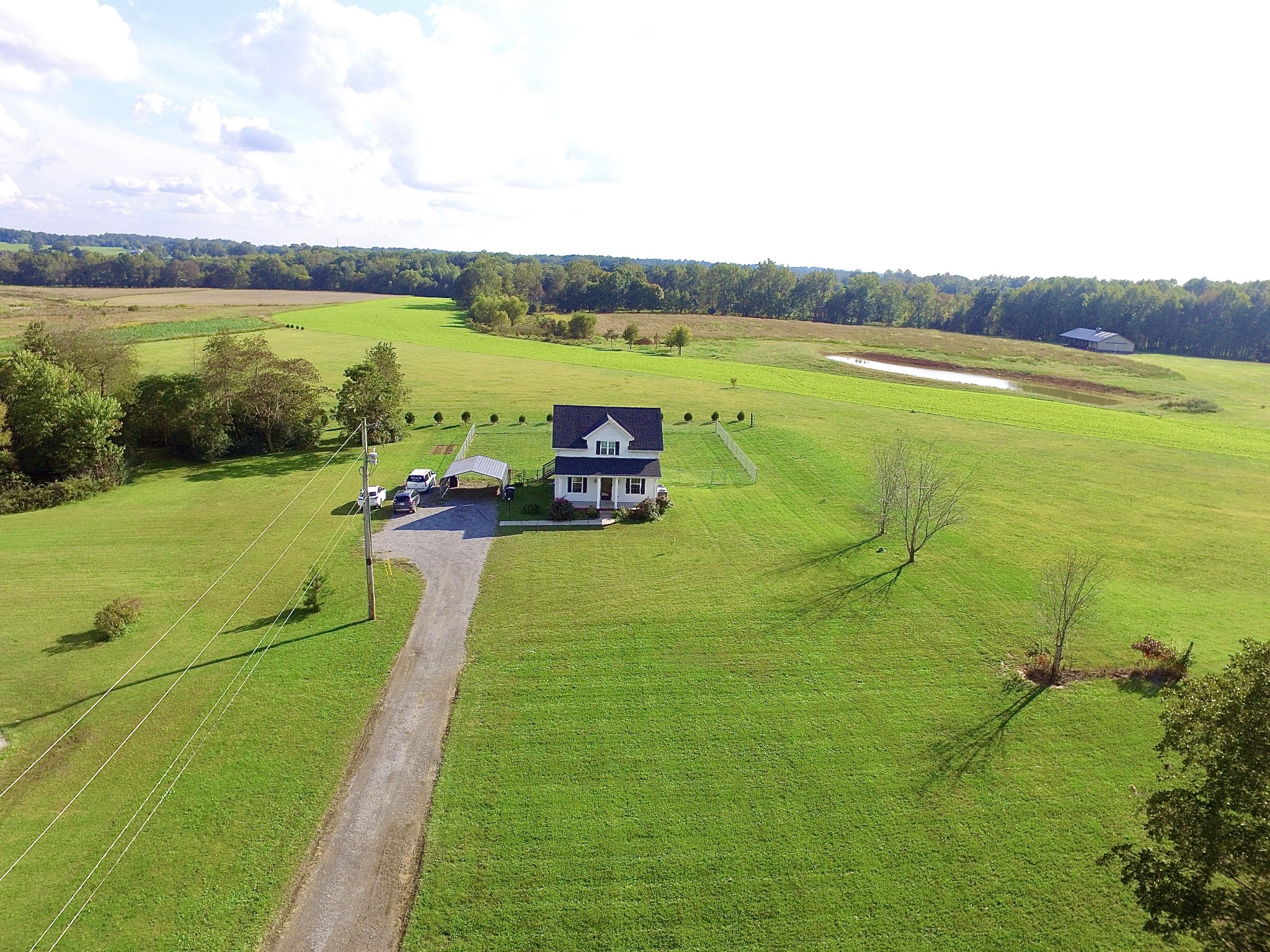 319 Riot Road Portland, TN 37148 - Photo 2 of 26 a view of a lake with a big yard