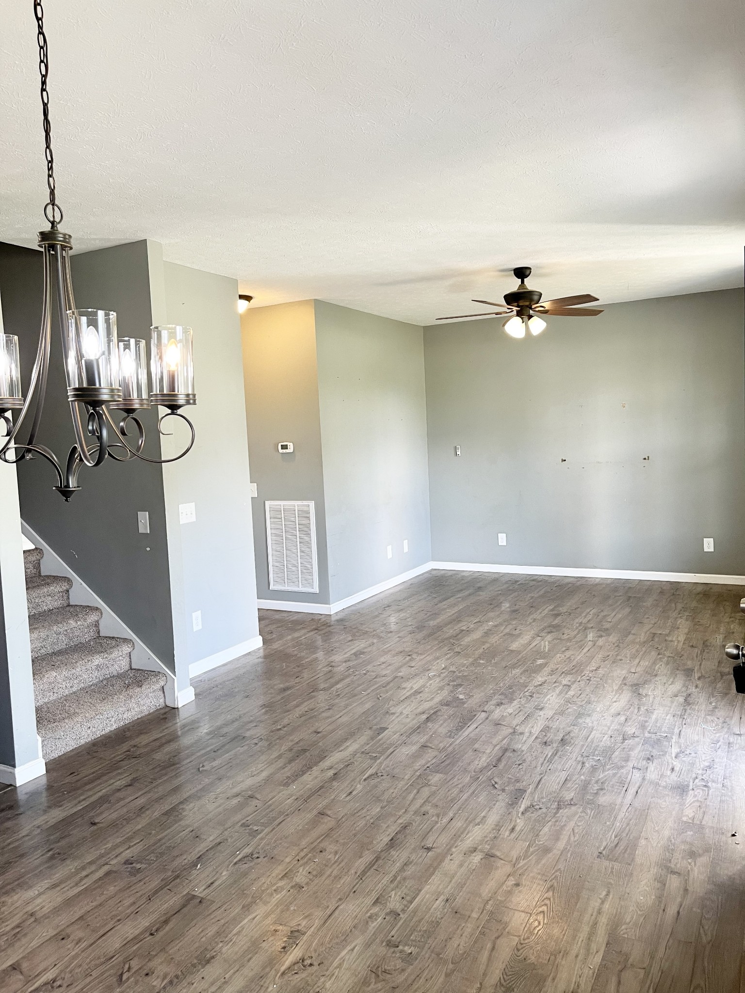 319 Riot Road Portland, TN 37148 - Photo 12 of 26 an empty room with wooden floor