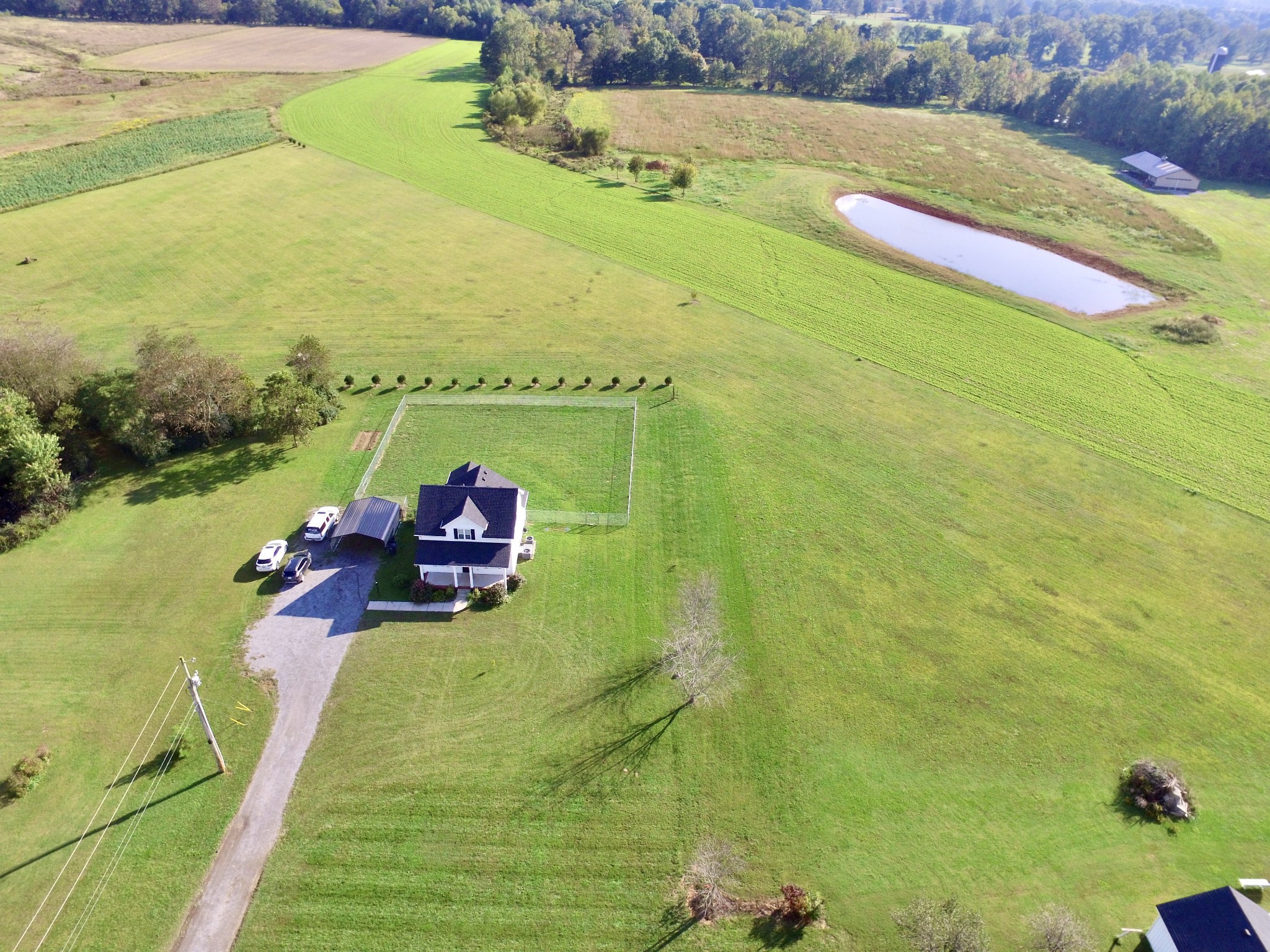 319 Riot Road Portland, TN 37148 - Photo 3 of 26 a view of a lake with a yard