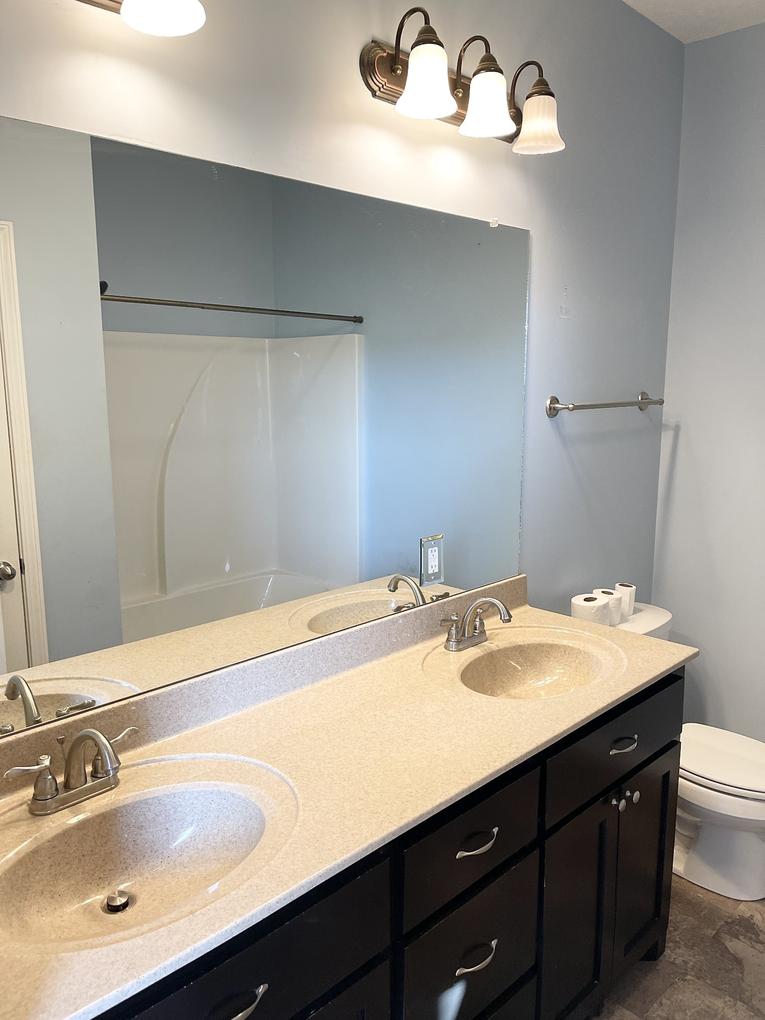 319 Riot Road Portland, TN 37148 - Photo 21 of 26 a bathroom with a sink and a mirror