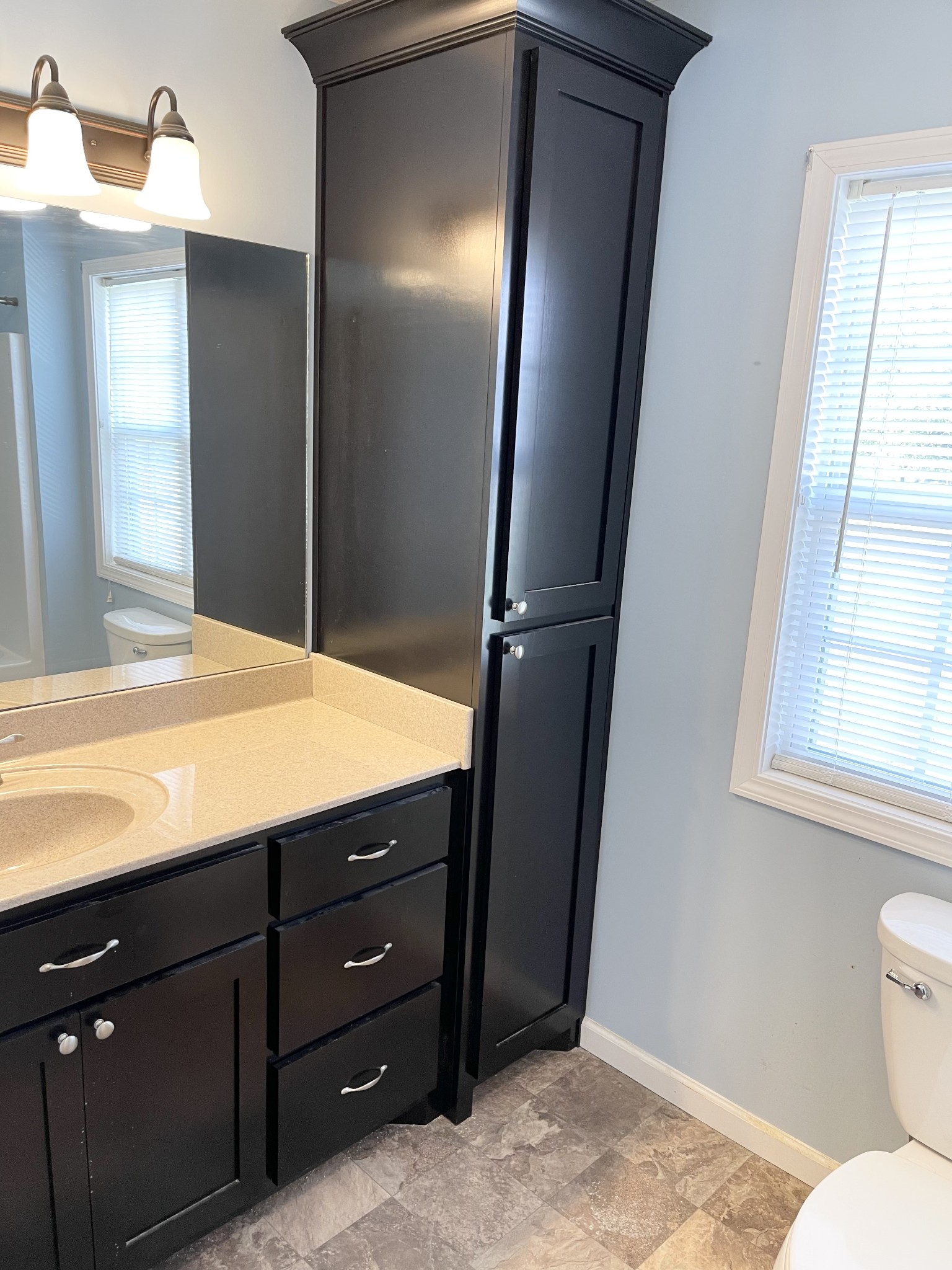 319 Riot Road Portland, TN 37148 - Photo 22 of 26 a bathroom with a sink and a mirror