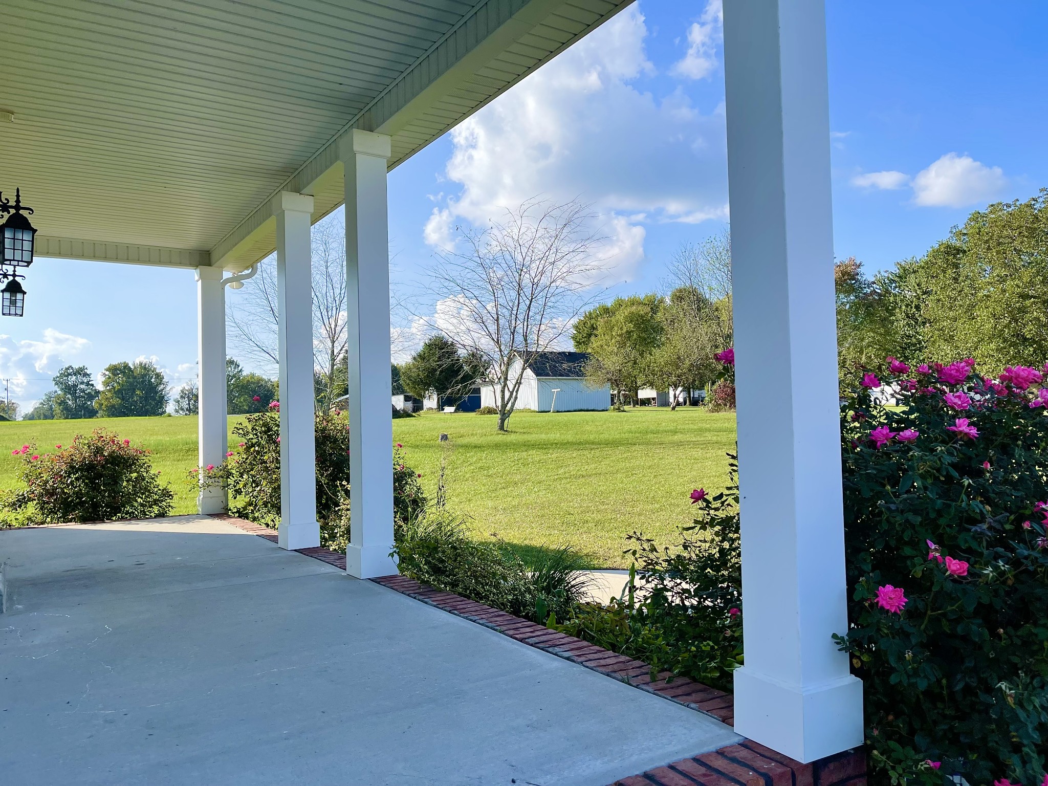 319 Riot Road Portland, TN 37148 - Photo 5 of 26 a view of a house with a yard and garden
