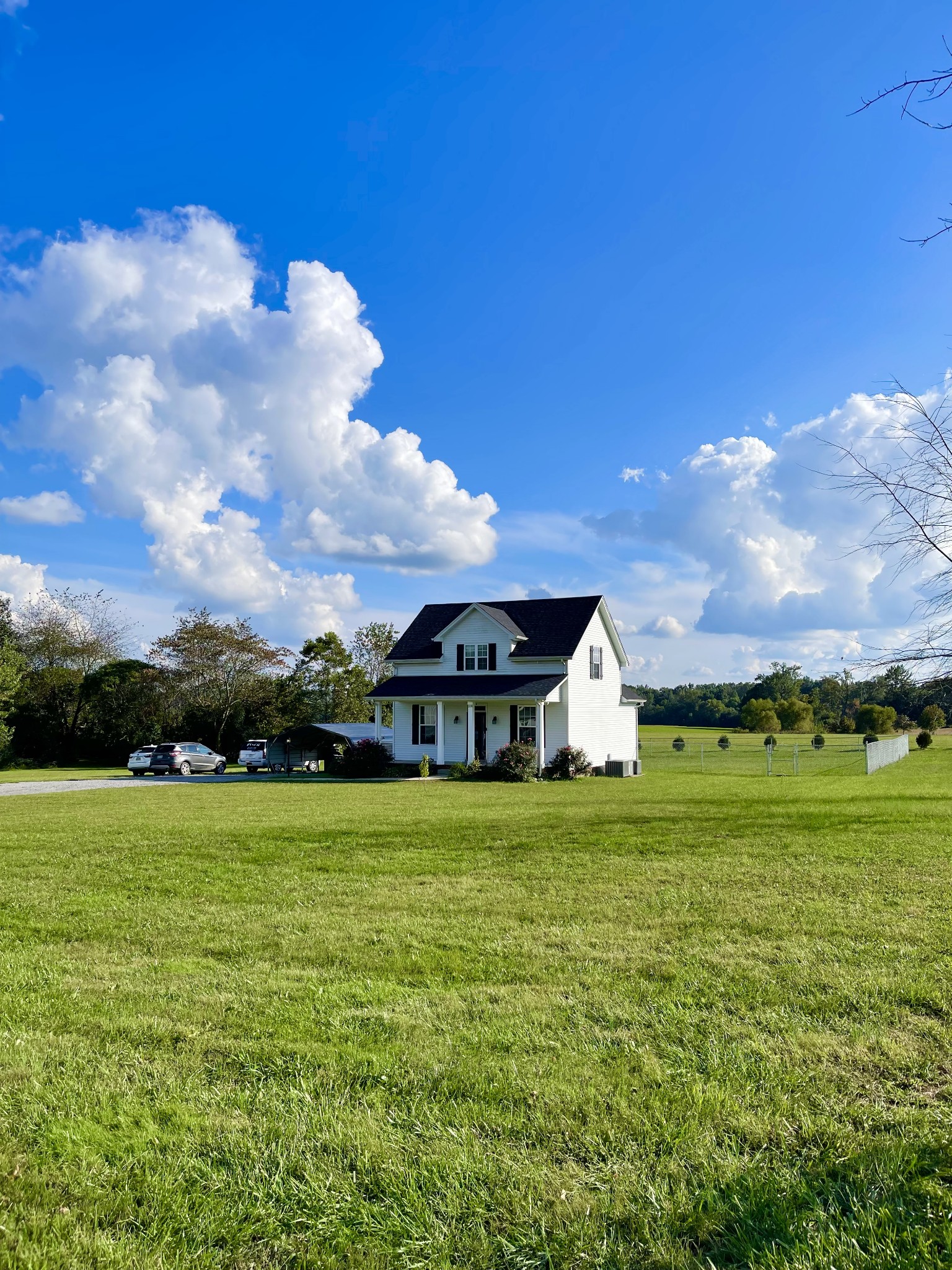319 Riot Road Portland, TN 37148 - Photo 7 of 26 a view of a big yard with a house in the background