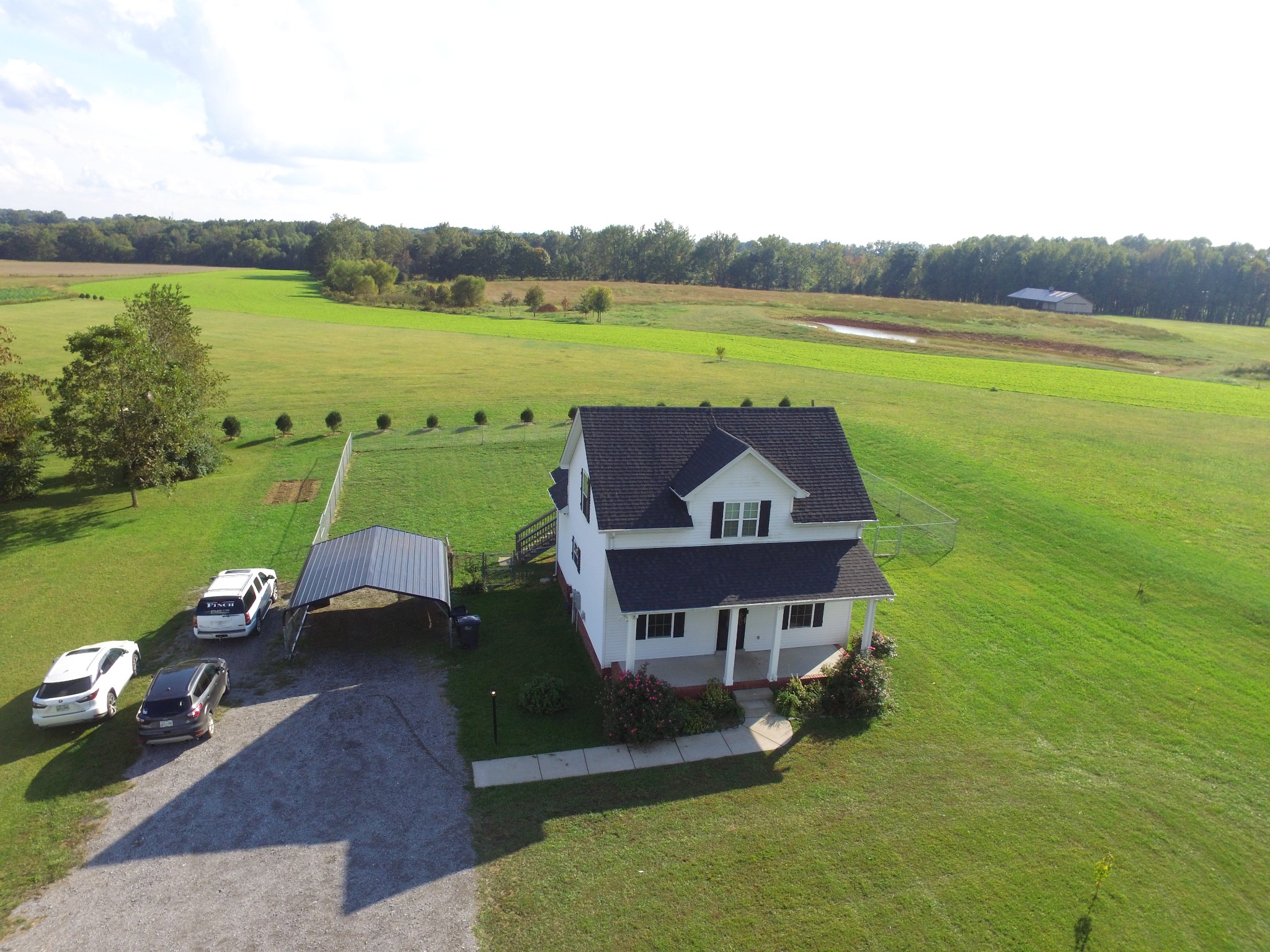 319 Riot Road Portland, TN 37148 - Photo 8 of 26 a view of a lake with a swimming pool