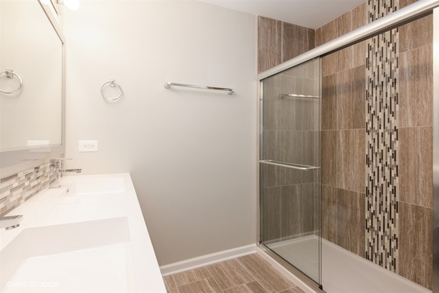 103 Crabtree Road East Dundee, IL 60118 - Photo 15 of 50 a bathroom with a sink and a shower