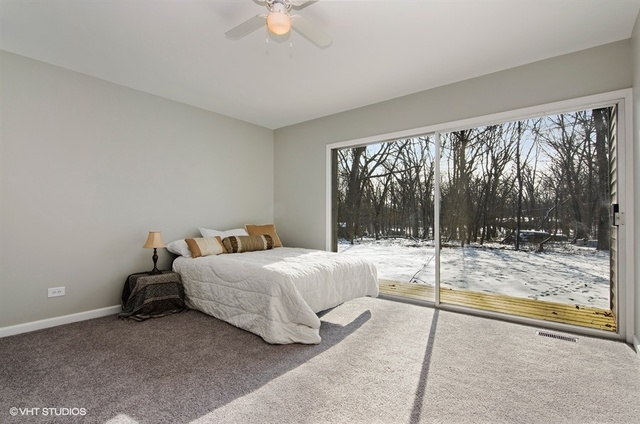 103 Crabtree Road East Dundee, IL 60118 - Photo 16 of 50 a bedroom with a bed and a large window