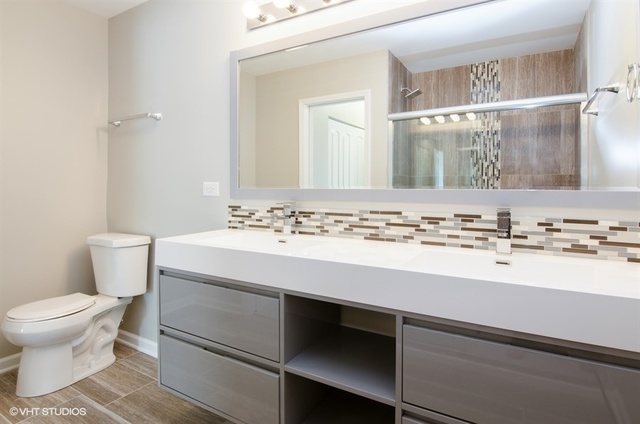 103 Crabtree Road East Dundee, IL 60118 - Photo 17 of 50 a bathroom with a sink toilet and shower