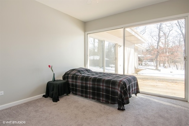 103 Crabtree Road East Dundee, IL 60118 - Photo 21 of 50 a bedroom with a bed and a large window
