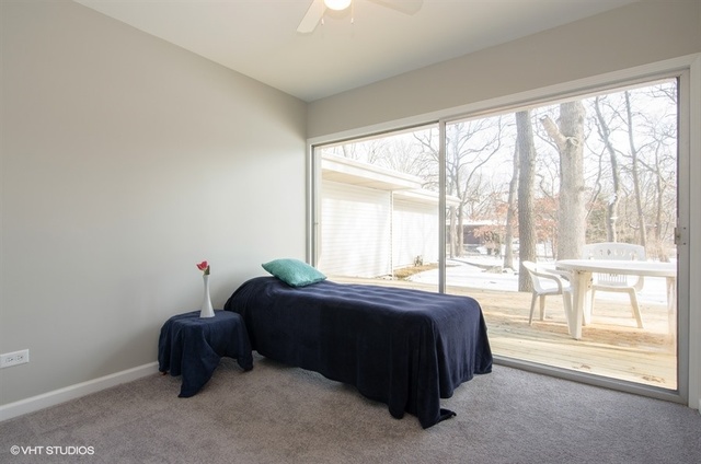 103 Crabtree Road East Dundee, IL 60118 - Photo 25 of 50 a spacious bedroom with a bed and a large window