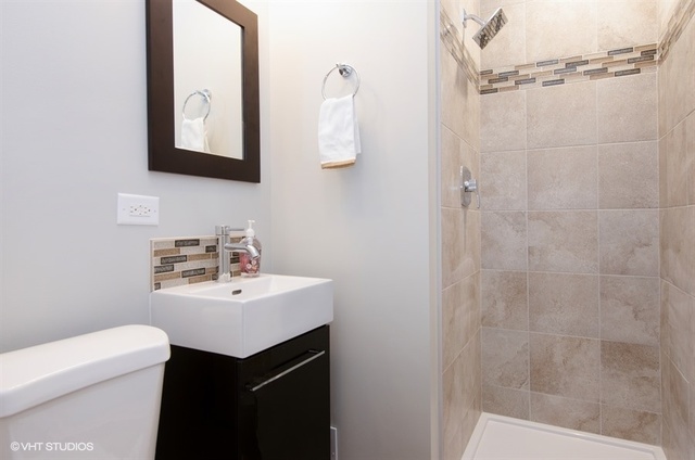 103 Crabtree Road East Dundee, IL 60118 - Photo 26 of 50 a bathroom with a sink a toilet a shower and a mirror