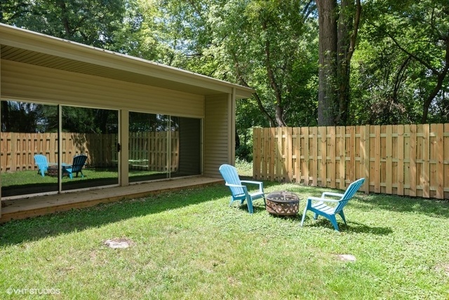 103 Crabtree Road East Dundee, IL 60118 - Photo 28 of 50 a view of a chair and table in backyard of the house