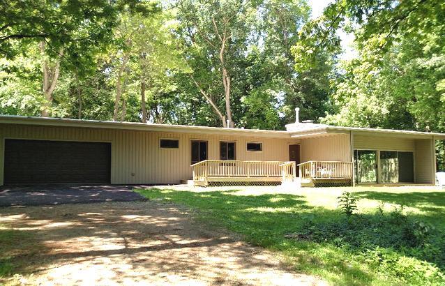 103 Crabtree Road East Dundee, IL 60118 - Photo 35 of 50 a house view with a sitting space and garden