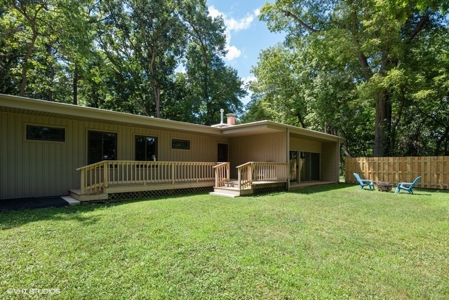 103 Crabtree Road East Dundee, IL 60118 - Photo 36 of 50 a view of a house with a yard and a wooden deck