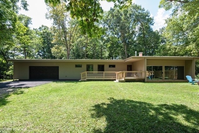 103 Crabtree Road East Dundee, IL 60118 - Photo 49 of 50 a front view of house with yard and trees in the background