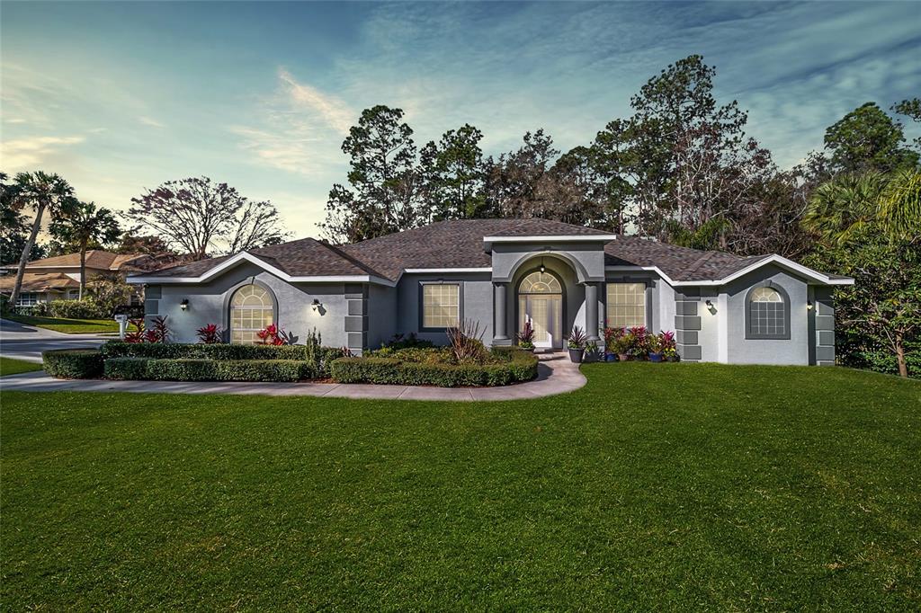 1801 Southwest 28th Street Ocala, FL 34471 - Photo 1 of 1 a front view of a house with garden