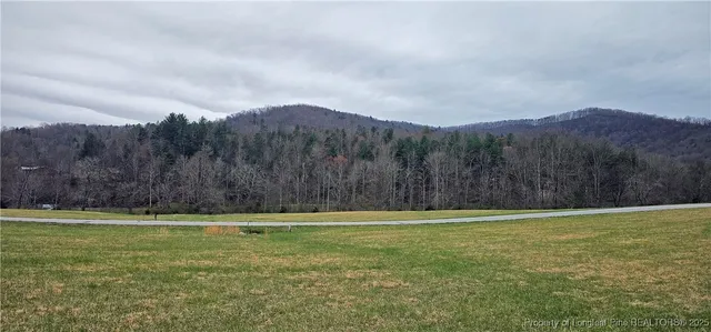 a view of outdoor space with mountain view