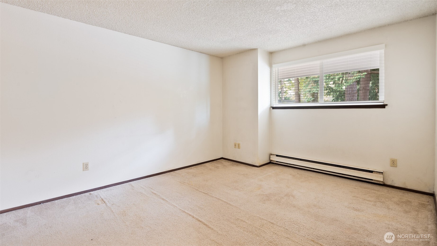 4601 Southwest 320th Street, Unit L6 Federal Way, WA 98023 - Photo 13 of 22 an empty room with windows
