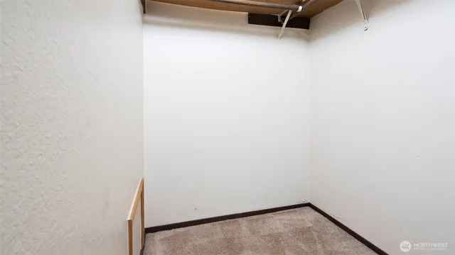 a view of a room with rack on the wall