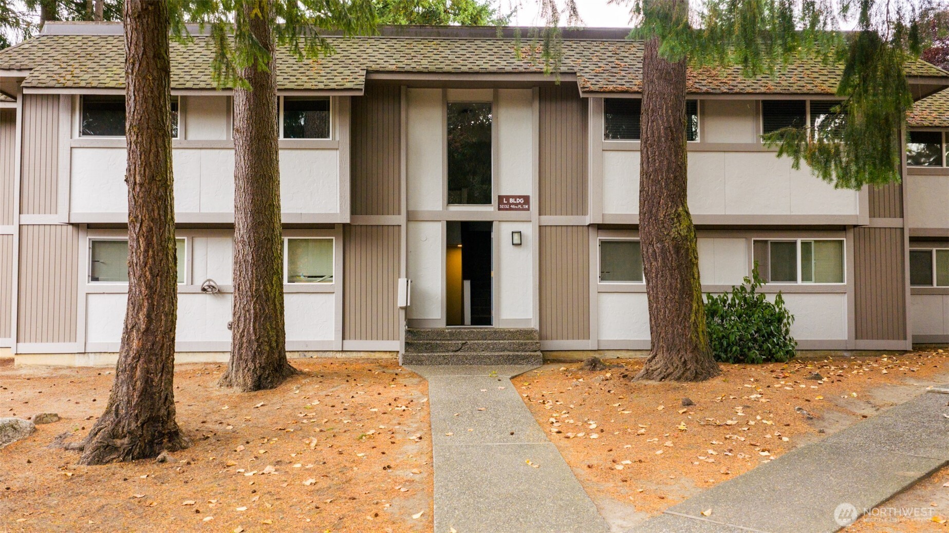 4601 Southwest 320th Street, Unit L6 Federal Way, WA 98023 - Photo 2 of 22 a front view of a house