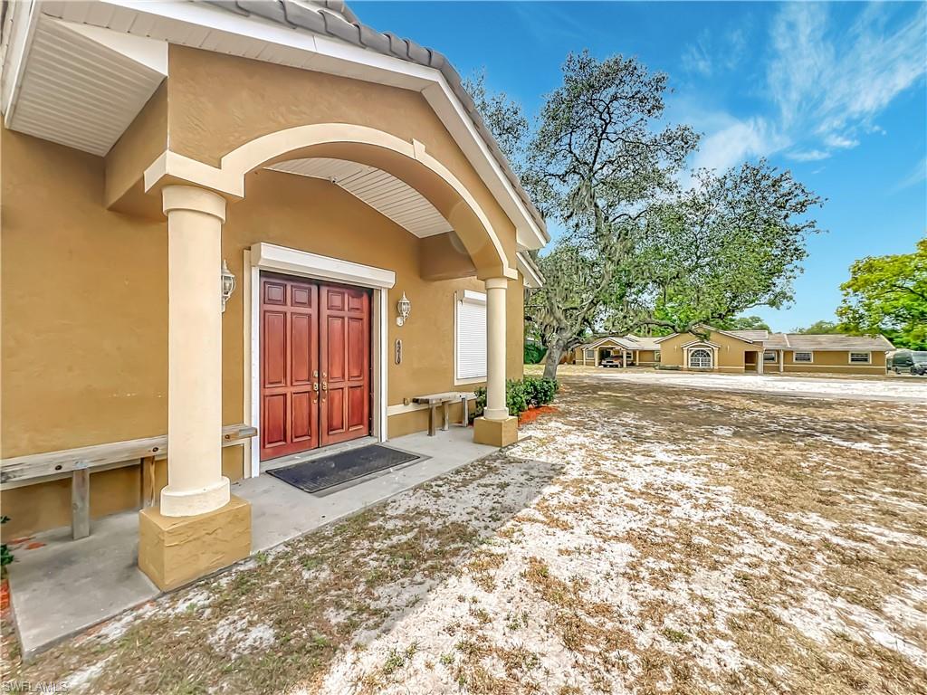 4210 South Hiawassee Road Orlando, FL 32835 - Photo 32 of 49 a front view of a house with a yard