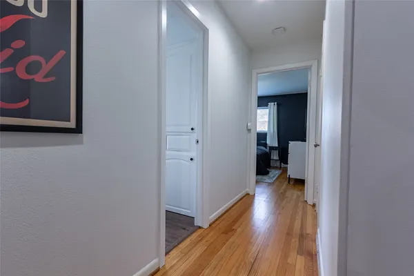 a bathroom with a double vanity sink and mirror