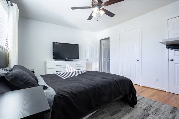 a room with furniture and wooden floor