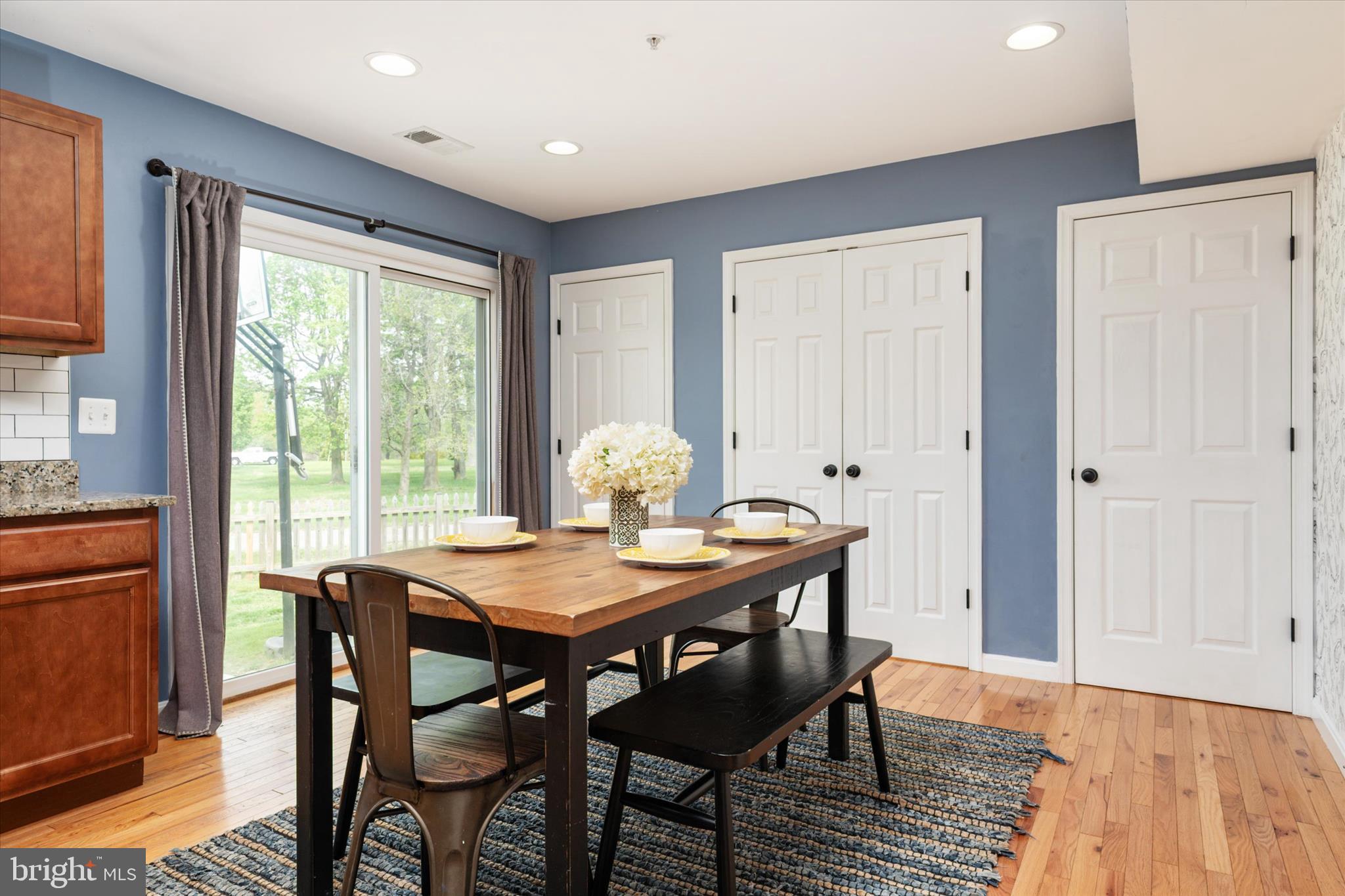 200 Newtown Road Chester, MD 21619 - Photo 17 of 50 a view of a dining room with furniture window and wooden floor