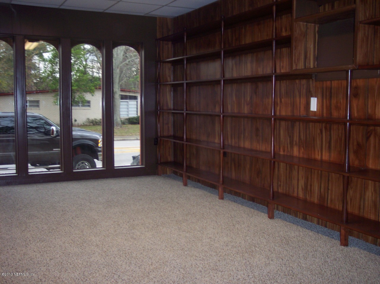 4725 Spring Park Road Jacksonville, FL 32207 - Photo 19 of 25 a view of an empty room with staircase