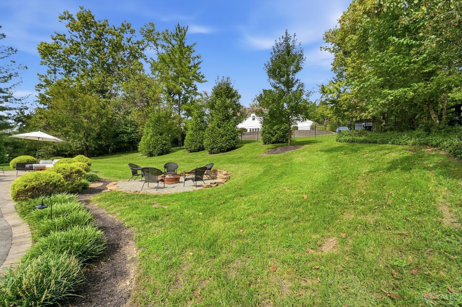 2430 Section Road Amberley, OH 45237 - Photo 72 of 81 Enjoy the firepit and spacious fenced yeard. Near three parks with wooded trails and paved paths.