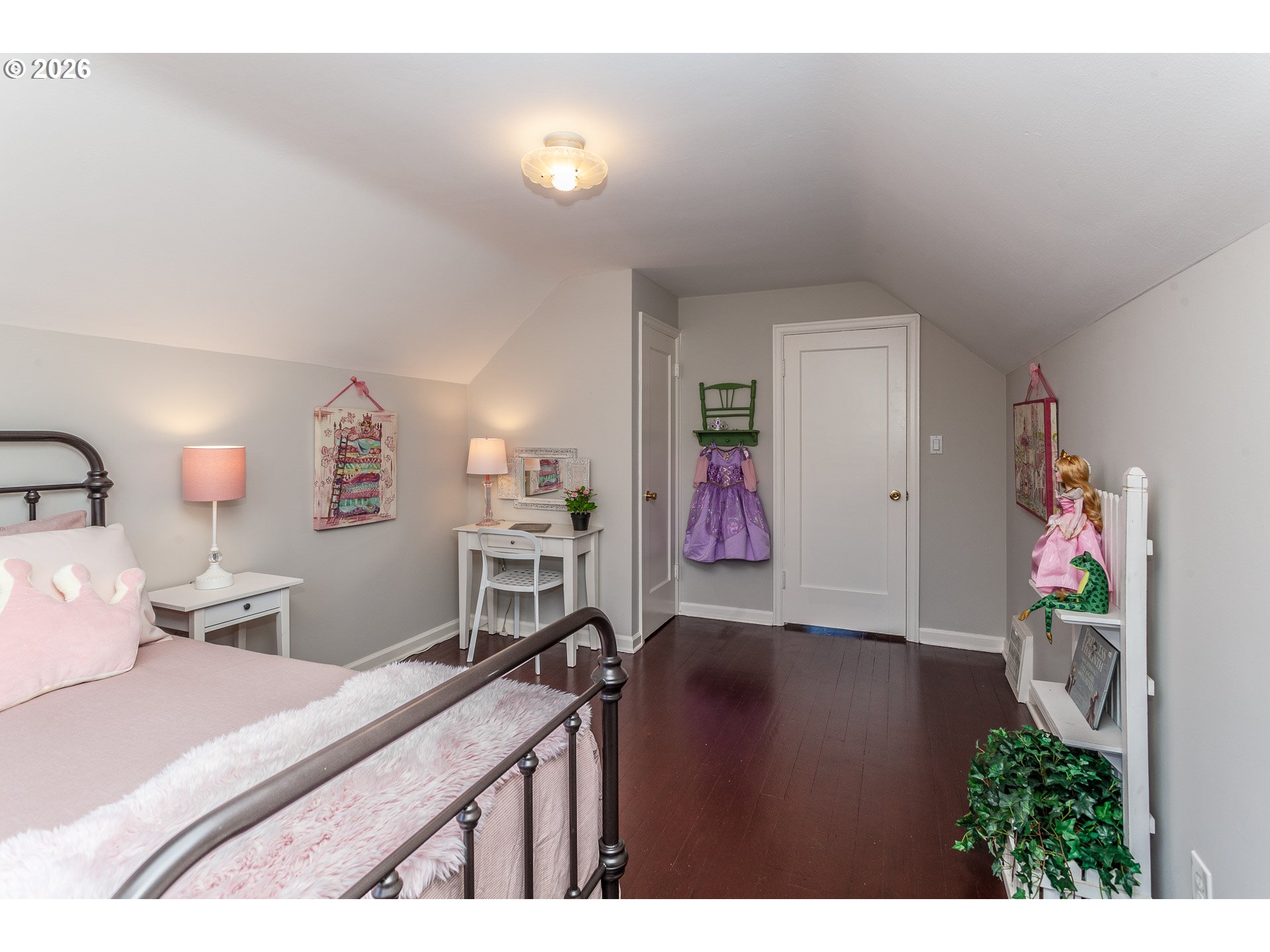 4760 North Harvard Street Portland, OR 97203 - Photo 16 of 43 a bed room with a bed and a desk