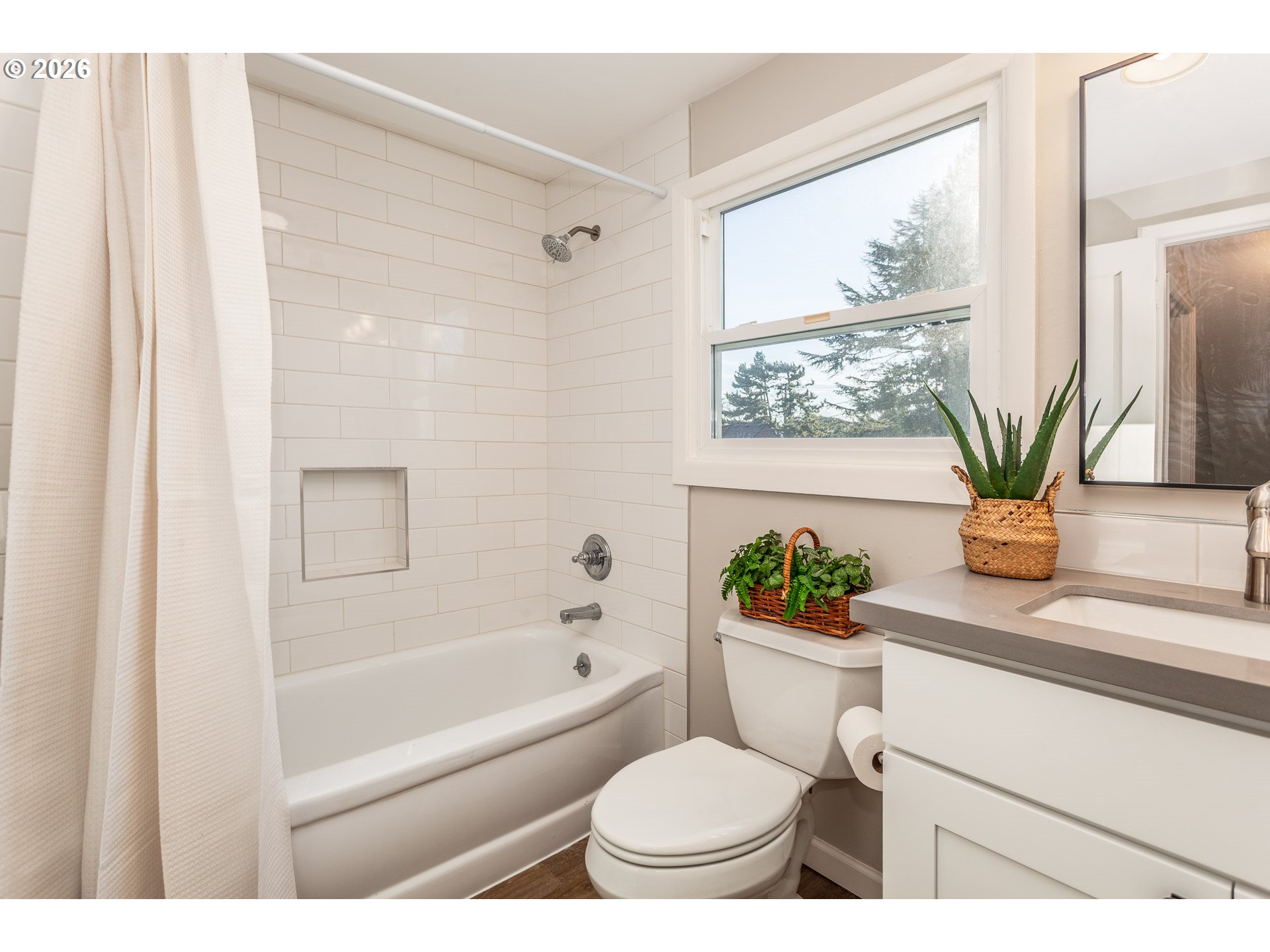 4760 North Harvard Street Portland, OR 97203 - Photo 17 of 43 a bathroom with a sink a toilet and a bathtub