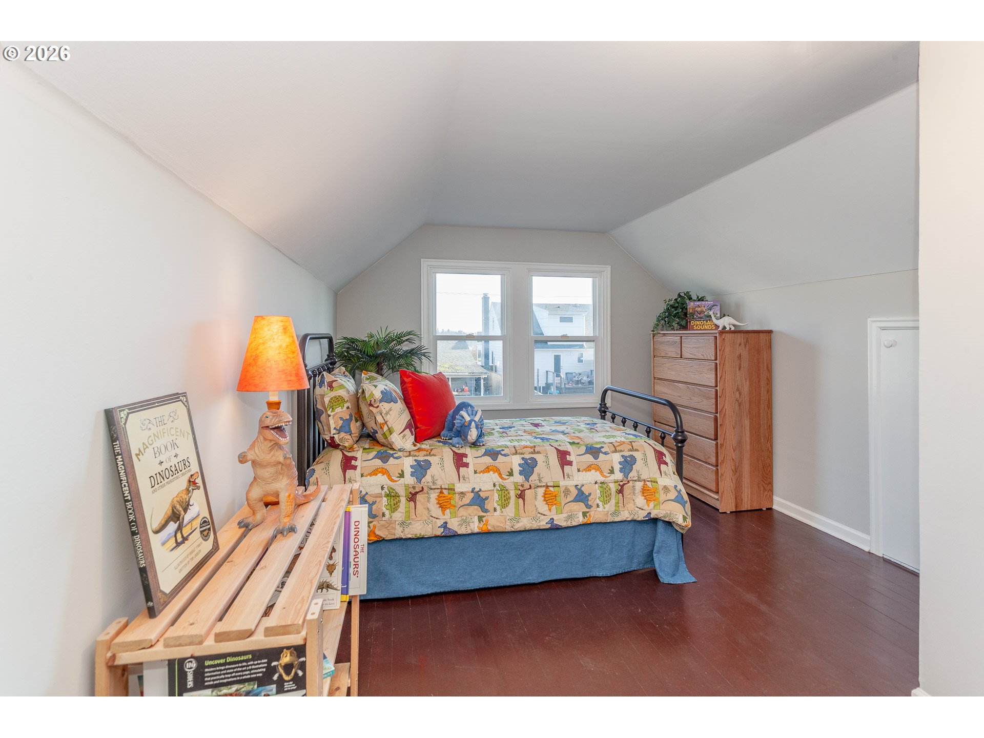 4760 North Harvard Street Portland, OR 97203 - Photo 20 of 43 a bed room with furniture and a window