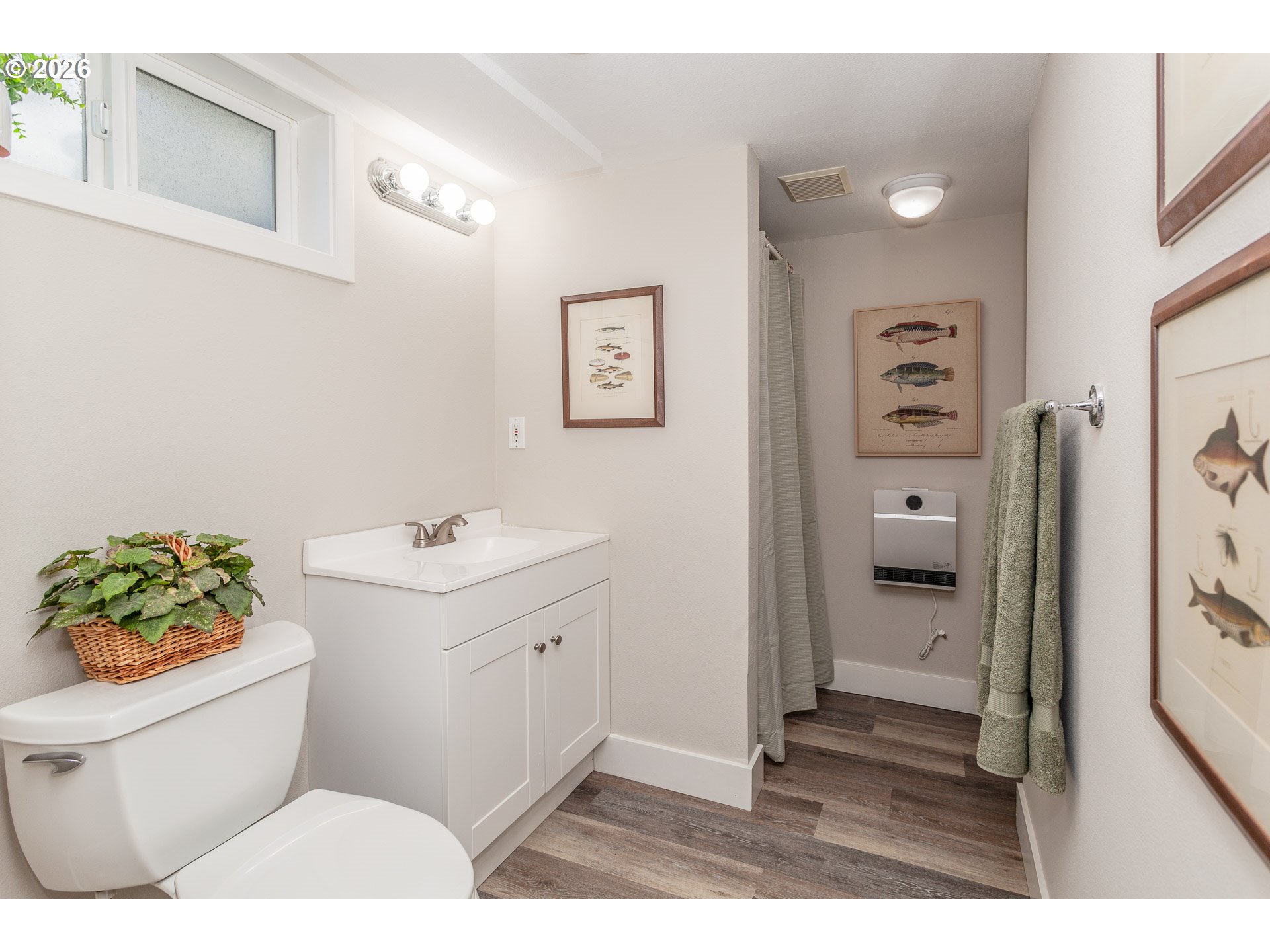 4760 North Harvard Street Portland, OR 97203 - Photo 27 of 43 a bathroom with a sink toilet and shower