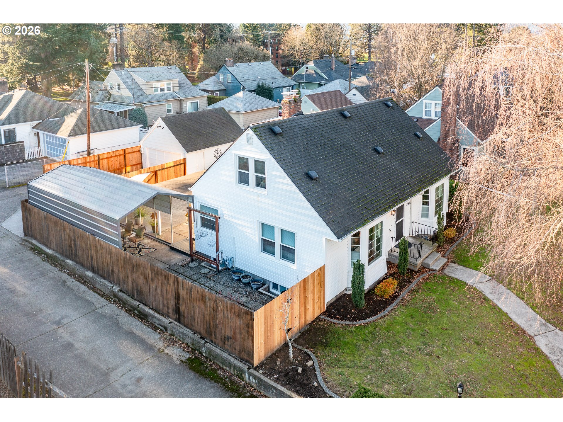 4760 North Harvard Street Portland, OR 97203 - Photo 31 of 43 a view of a house with wooden deck