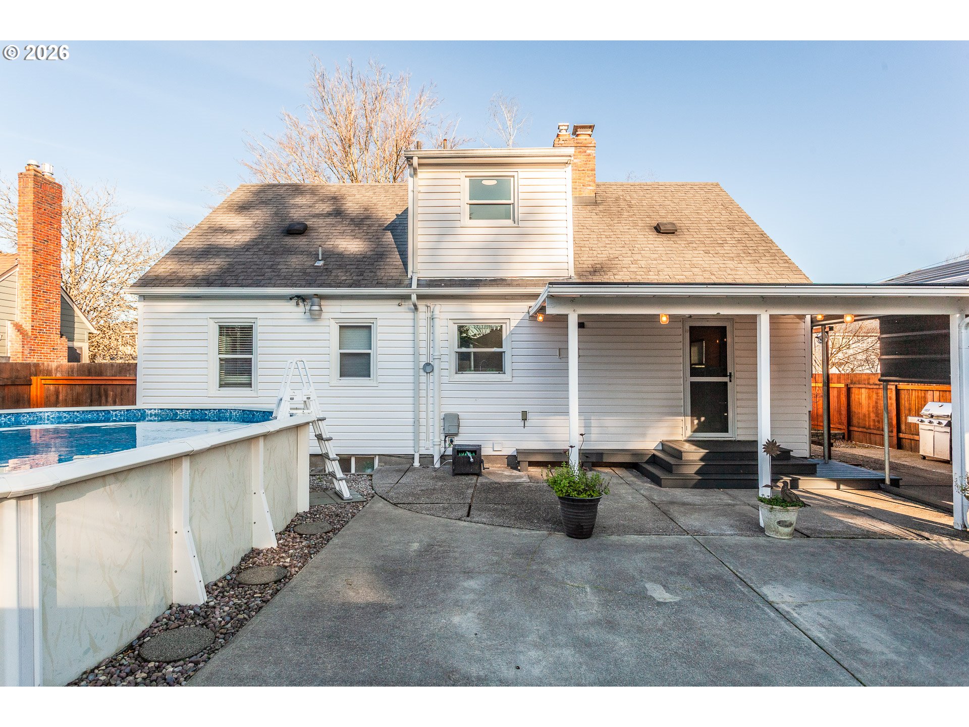 4760 North Harvard Street Portland, OR 97203 - Photo 36 of 43 a view of a house with backyard porch and sitting area