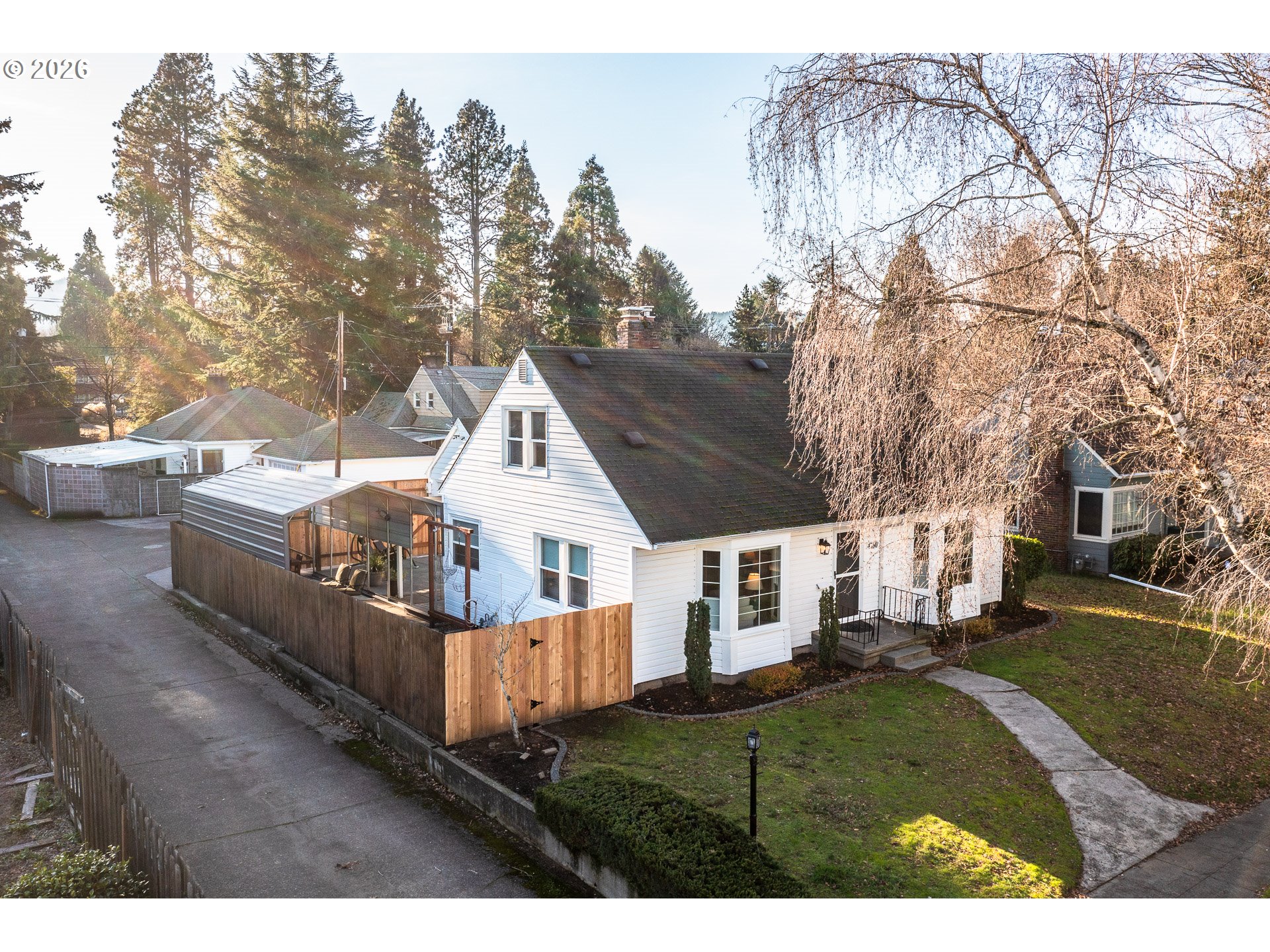 4760 North Harvard Street Portland, OR 97203 - Photo 43 of 43 a view of a house with backyard and trees