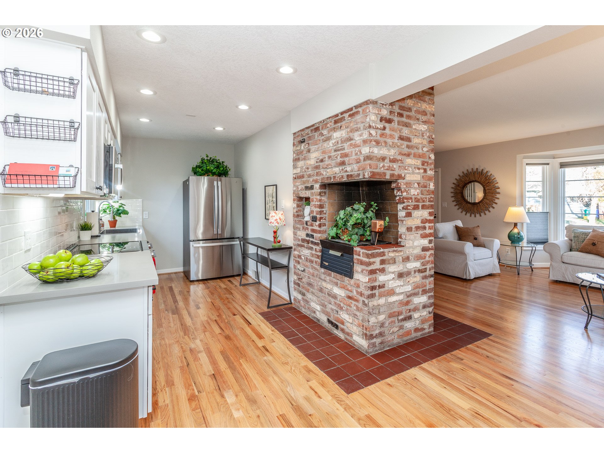 4760 North Harvard Street Portland, OR 97203 - Photo 5 of 43 a living room with furniture a fireplace and a table