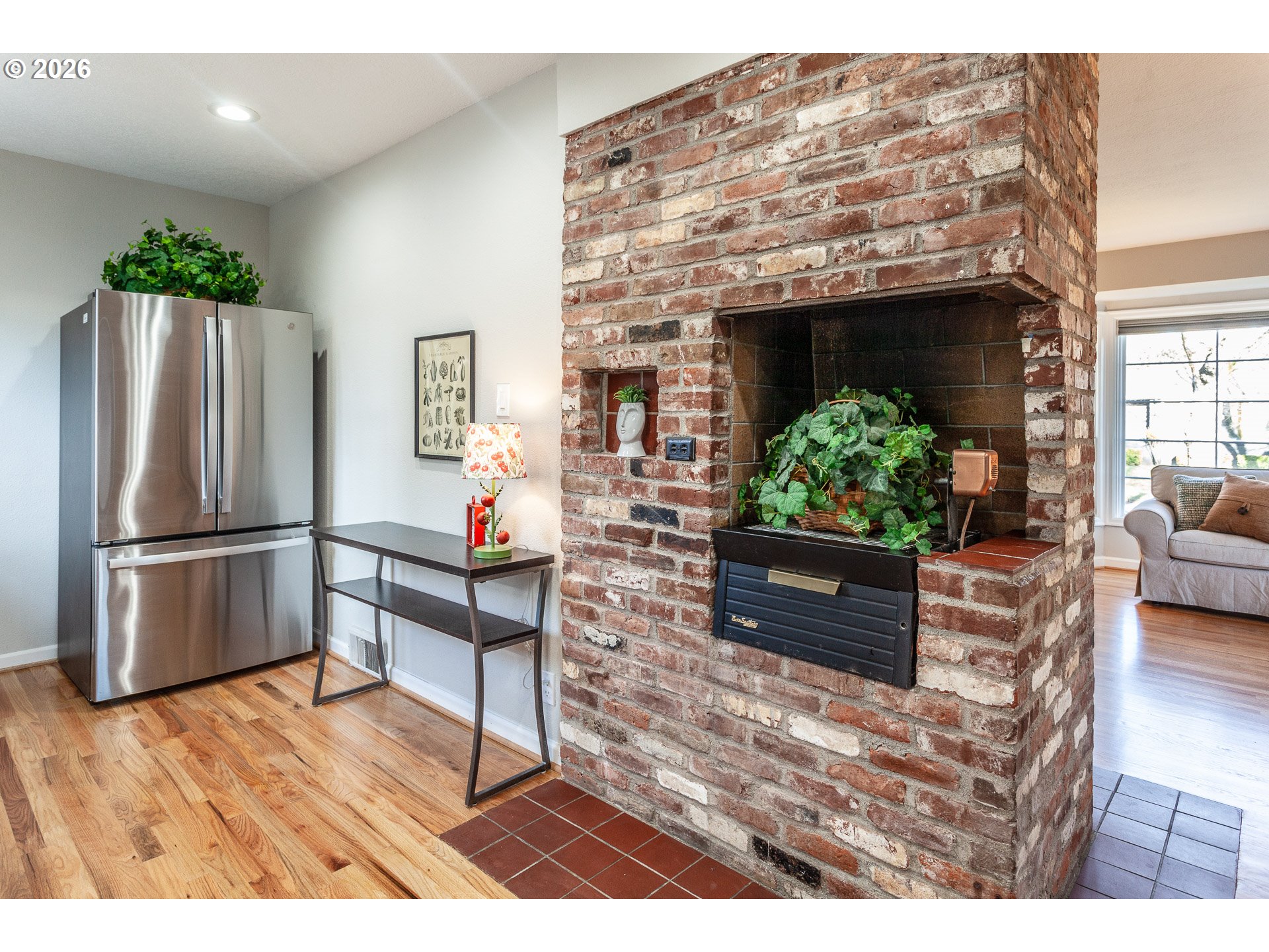 4760 North Harvard Street Portland, OR 97203 - Photo 7 of 43 a living room with furniture wooden floor and a fireplace