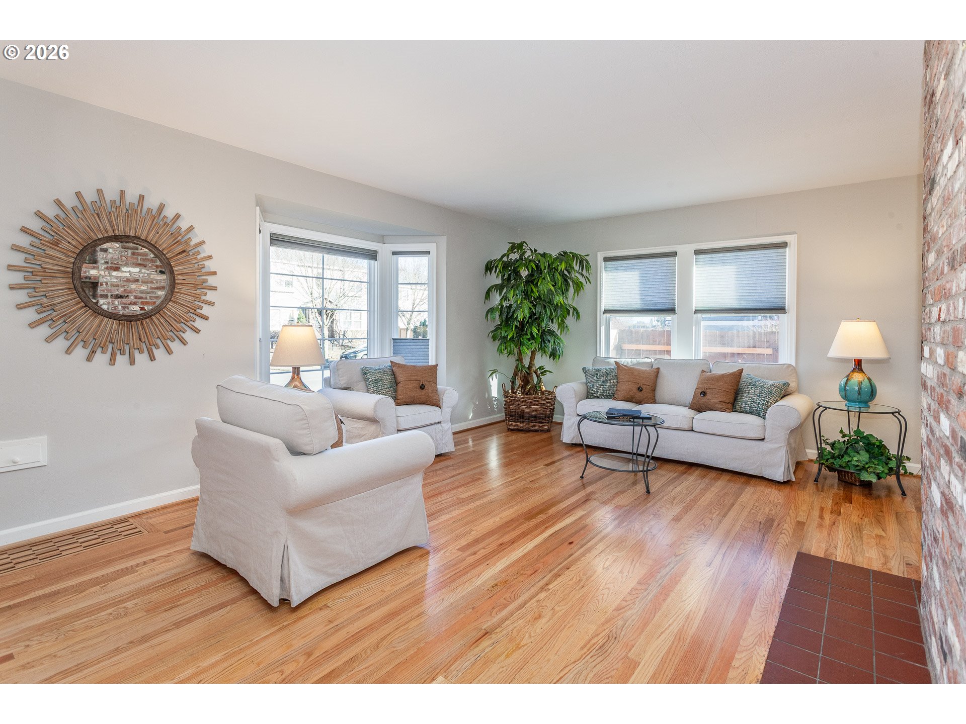 4760 North Harvard Street Portland, OR 97203 - Photo 9 of 43 a living room with furniture and a wooden floor