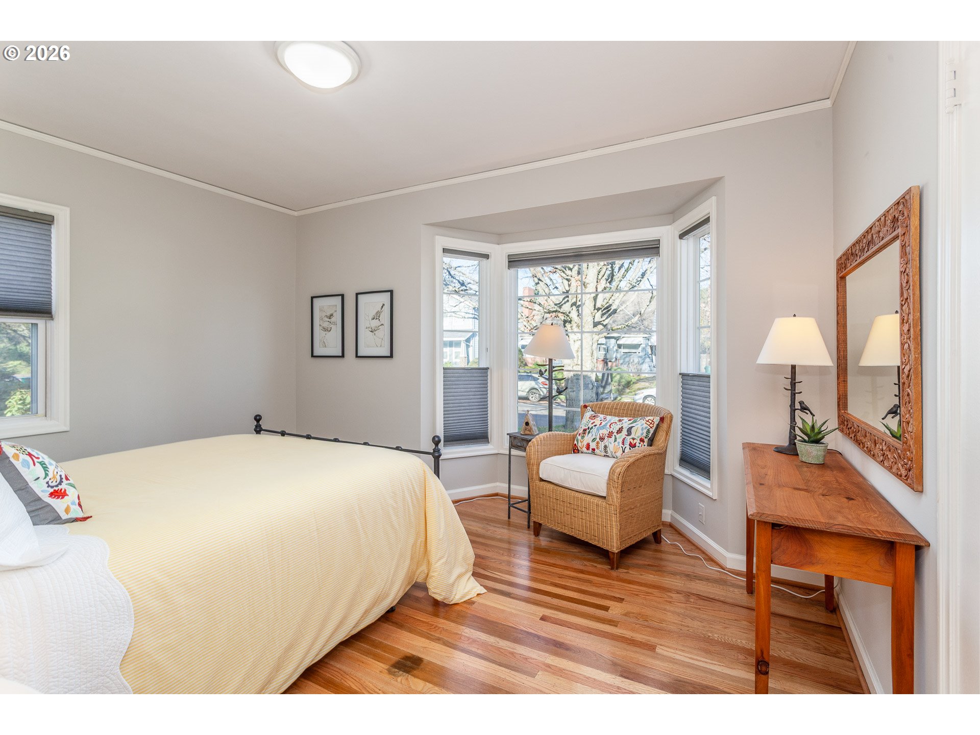 4760 North Harvard Street Portland, OR 97203 - Photo 10 of 43 a bedroom with a bed and large windows